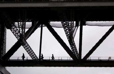 People Crossing Bridge photo
