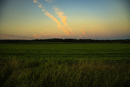 The Orange Skies of Dusk over the farm photo