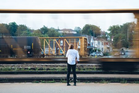 Man Watches Trains