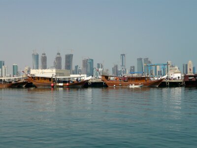 A dhow returns to harbour in Doha, Qatar photo