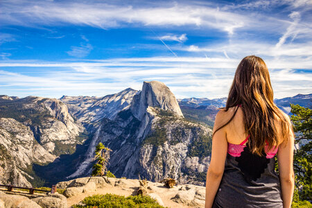 Young Brunette Looking at Half Dome, Yosemite Valley photo
