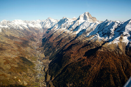 Mountain, town, and valley landscape in Ferden, Switzerland photo