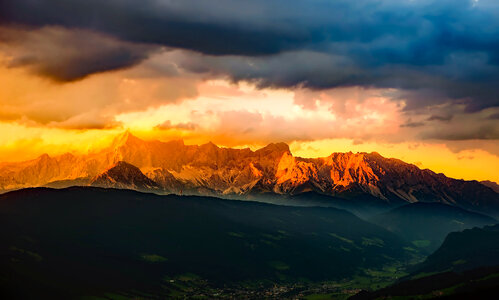 Golden Mountain Tops over the Alps in Austria photo