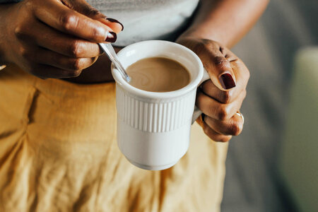 Woman drinking coffee photo