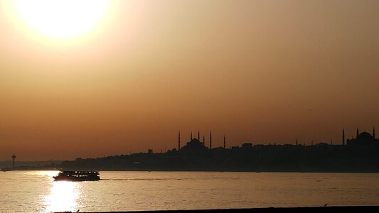 Backlight beach boat photo