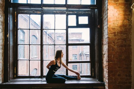 Woman Exercise Window Yoga photo