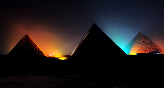 Pyramids at night in Giza, Egypt photo