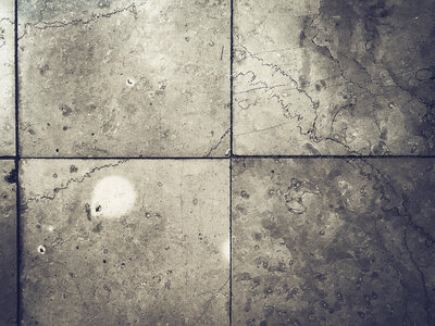 Grunge Grey Tiles on the Floor photo