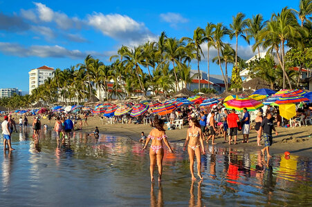 Unidentified people on the beach photo