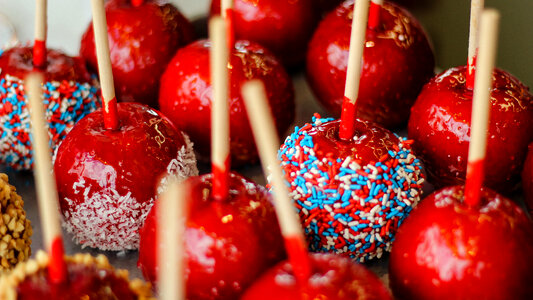 Candy apples coated in sweet shells photo
