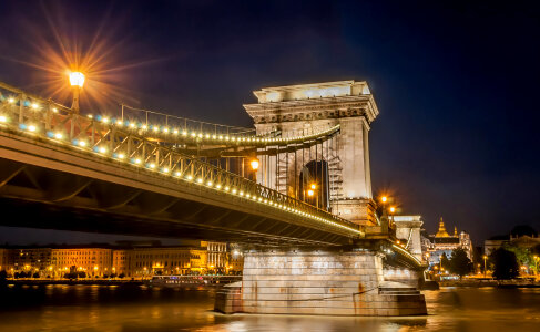 Closeup of the Bridge at night with the lights in Budapest, Hungary photo