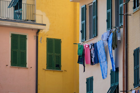 Clothes Left to Dry Hanging in Front of the Balcony photo
