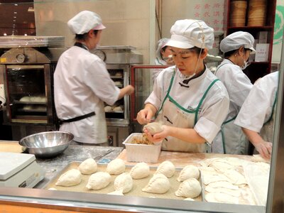 Dumplings women working