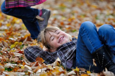 Laugh autumn leaves photo