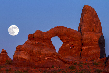 Supermoon over arches national park photo