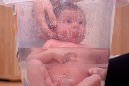 Baby infant taking bath