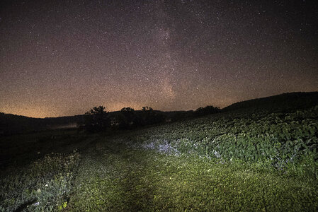 Galaxy coming up from the landscape