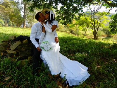 Honeymoon couple in nature grooms in nature