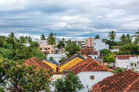 Rooftops view with clouds in a village in India photo