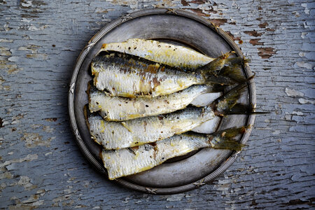 Grilled headless sardines photo
