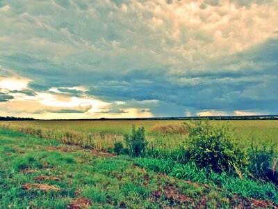 Storm clouds field photo
