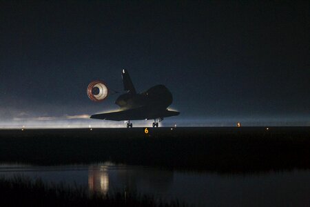 Runway night parachute photo