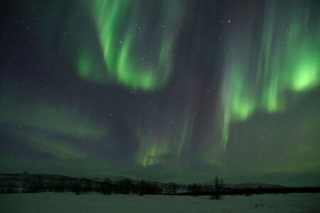 Aurora borealis solar wind light phenomenon photo