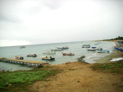 Beach boat coast photo