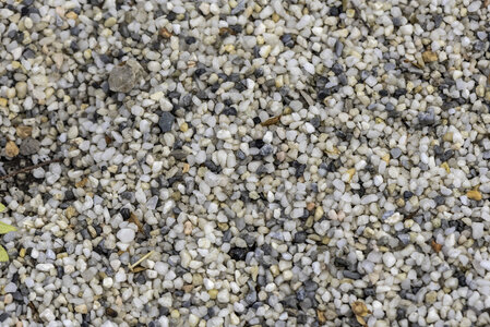 Pebbles gravel on the ground photo