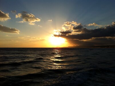 Romantic sun and sea evening mood at the lake photo
