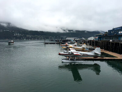 Planes in the Docks with Planes with cloudy sky in Juneau, Alaska photo