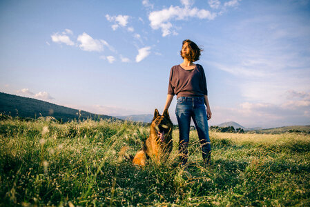 Woman Walking with her Dog German Shepherd photo