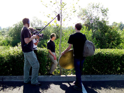 Filming Nutria Near a Parking Lot photo