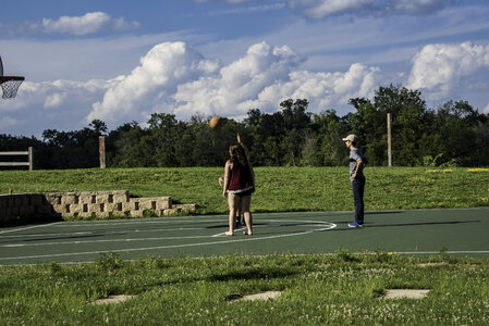 Kids playing Basketball on the playground photo