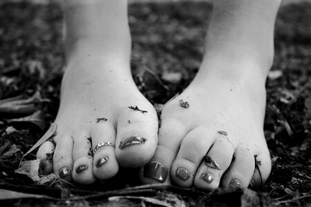 Woman Feet Black White Leaves photo