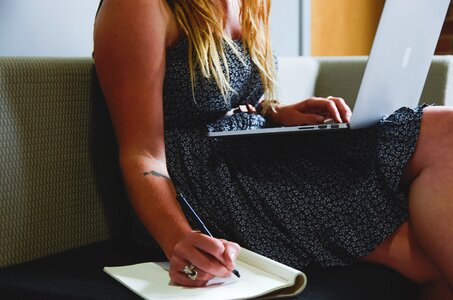 Woman Taking Notes photo