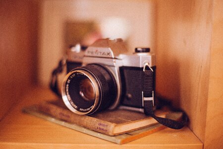 Slr single-lens reflex camera book shelf photo