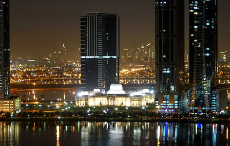 Night view of the New Sharjah Chamber of Commerce in the United Arab Emirates photo