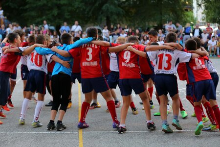 Team hugging dance