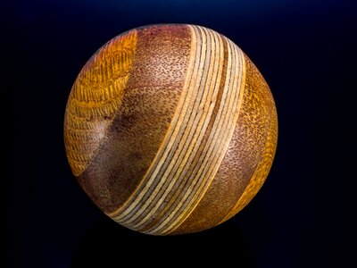 Wooden ball turned hand labor photo