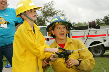 Child learns about refuge fire management photo