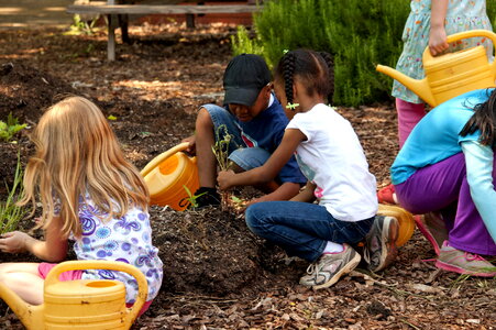 Cute female child gardening