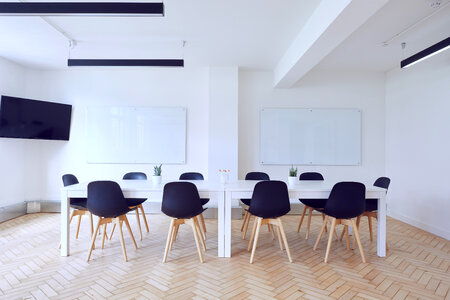 Empty Conference Room, White Tables and Black Chairs photo