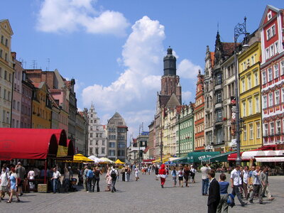 Buildings, street, and people in Wrocław photo