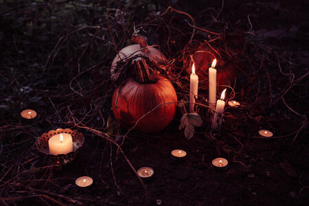 Halloween Outdoors Decoration Candles Burning with Pumpkins photo