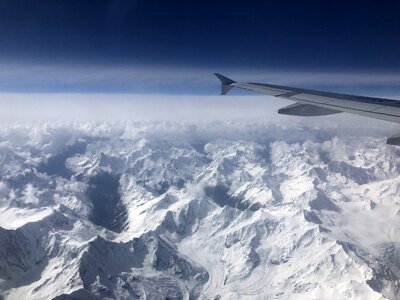 View of the Everest Mountain from the airplane window photo