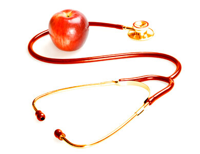 Red Stethoscope and Apple