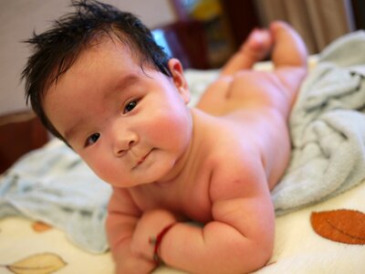 Infant asian smile photo