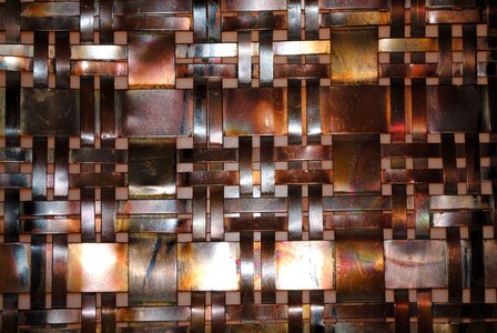 Woven metal wall