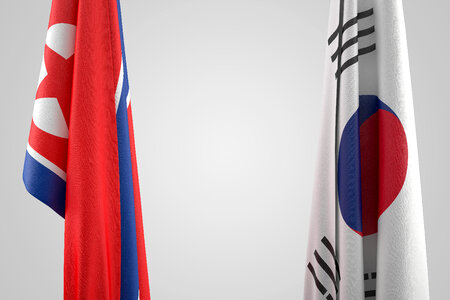 North Korea and South Korea Flags. Geopolitical concept. 3D illustration. Contains clipping path